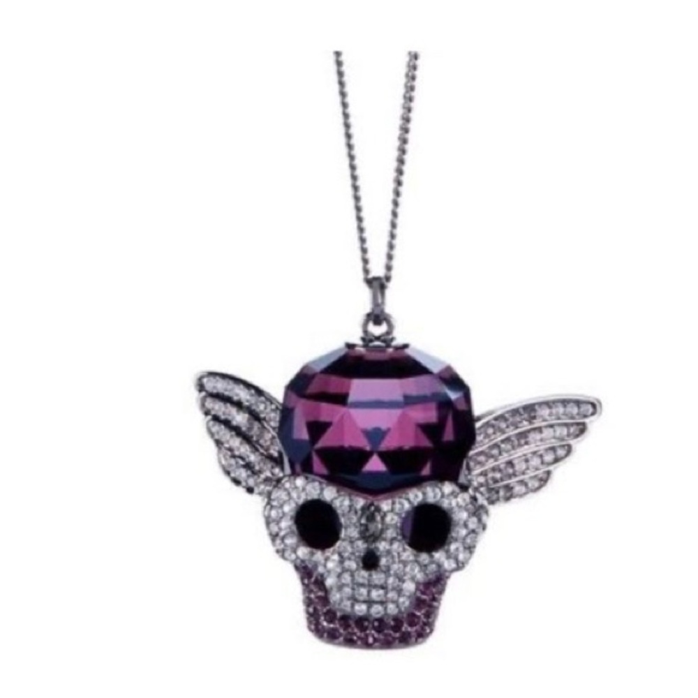 Authentic Swarovski multi faceted purple Skull ☠️ pendent.
